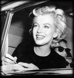 Marilyn signing autographs